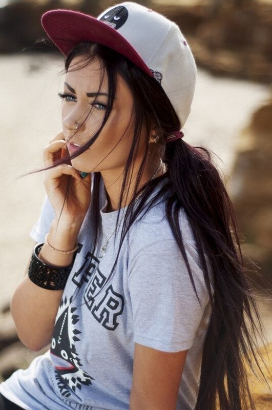 woman in cap and t-shirt