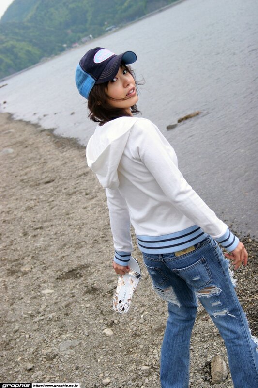 Woman in cap at the beach