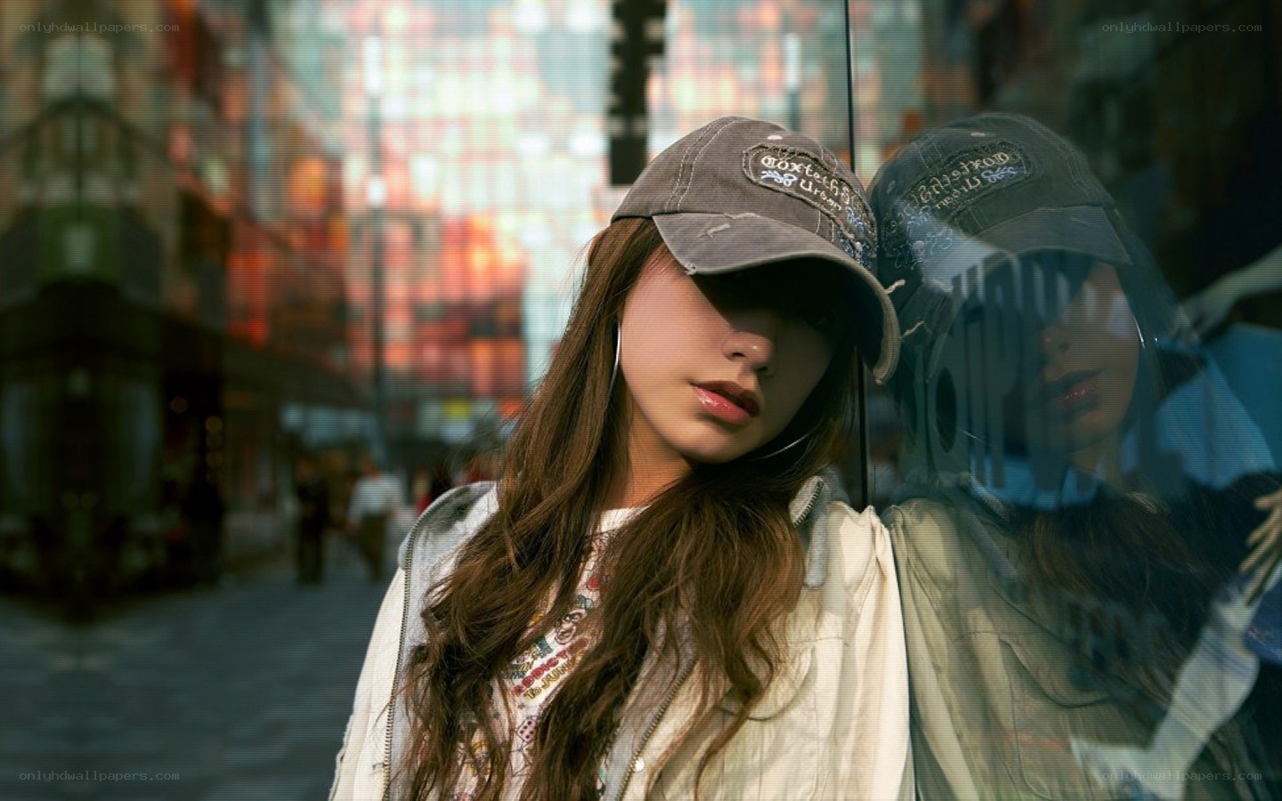 woman in cap by window