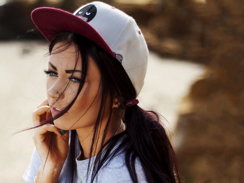 woman in cap with blue eyes
