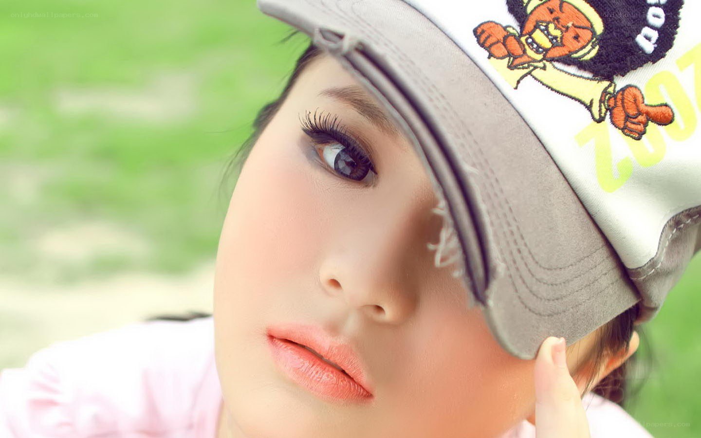 woman in cap with cartoon