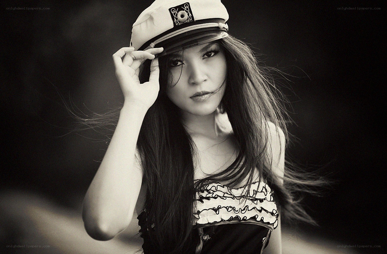 woman in captain's hat