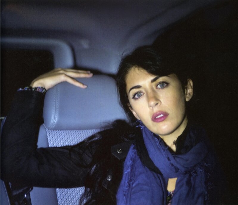 woman in car at night