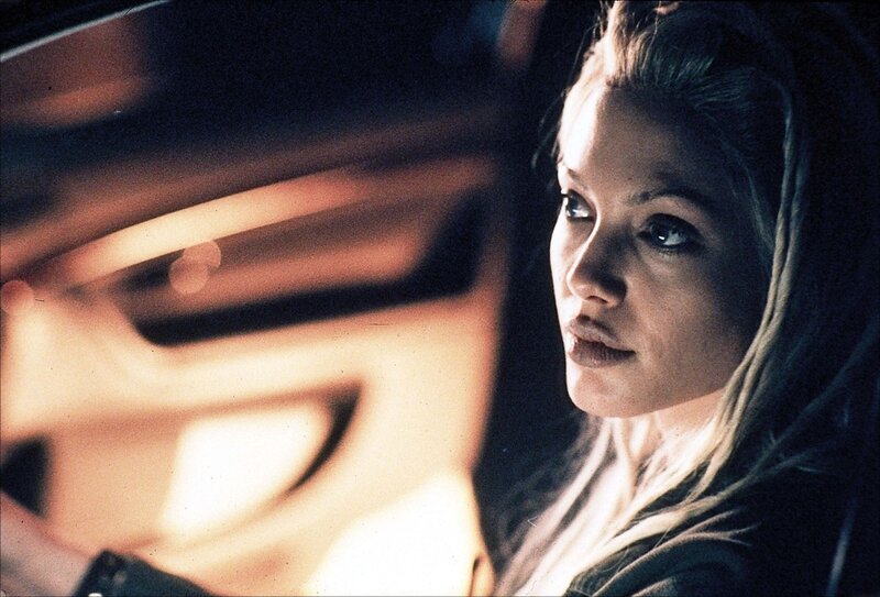 woman in car at night