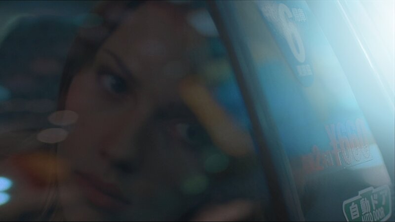 woman in car at night