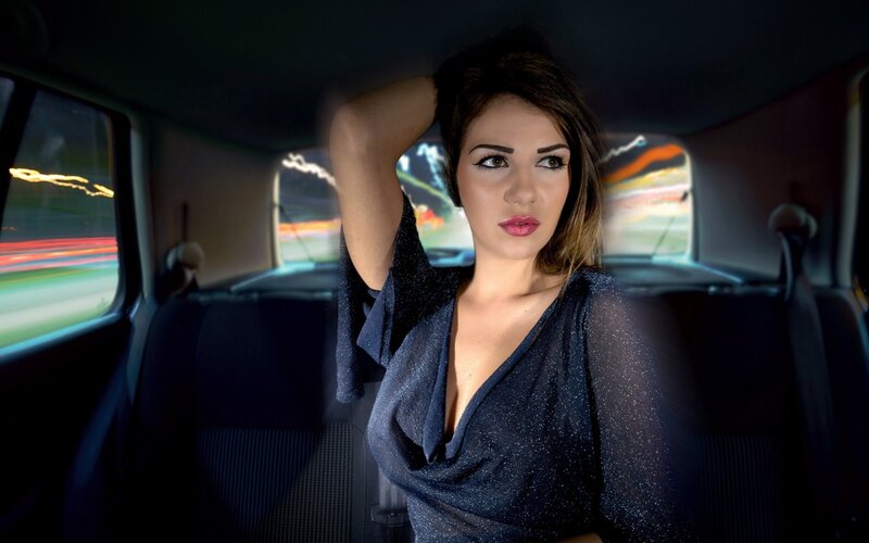 Woman in Car at Night — Black, Dramatic, Photograph, Car Interior, Light Trails