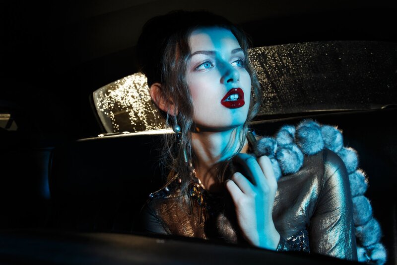 Woman in Car at Night — Blue, Dramatic