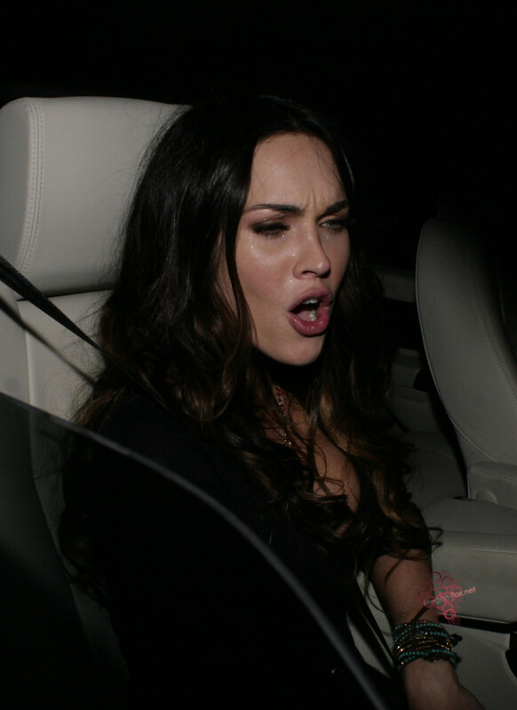 woman in car crying