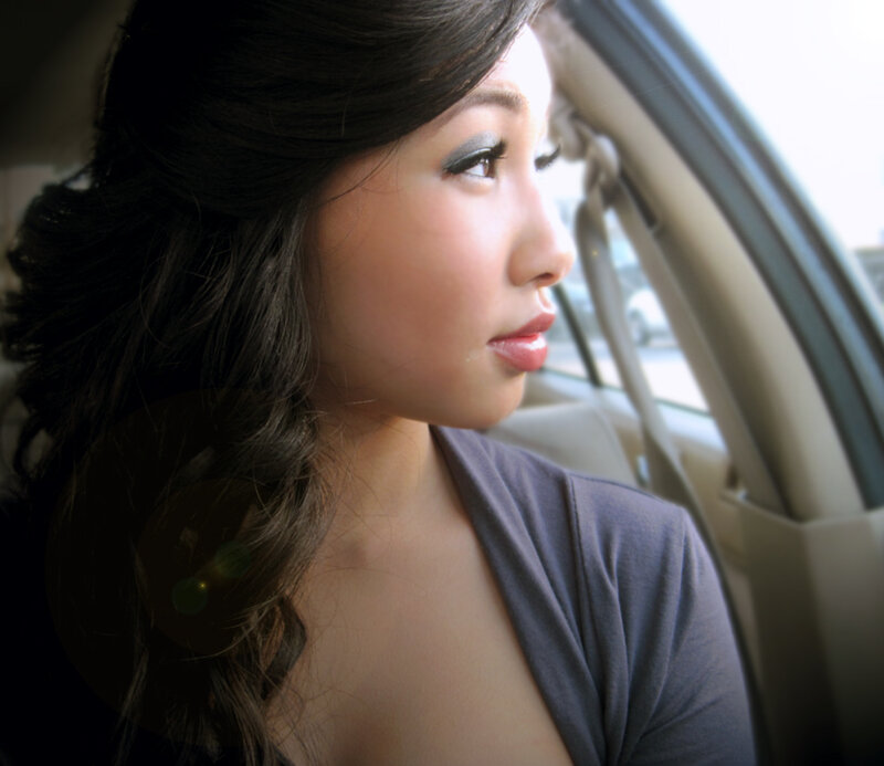 Woman in Car — Gray, Contemplative