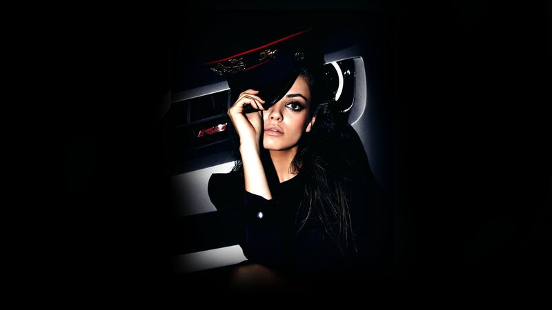 Woman in Car Holding Hat