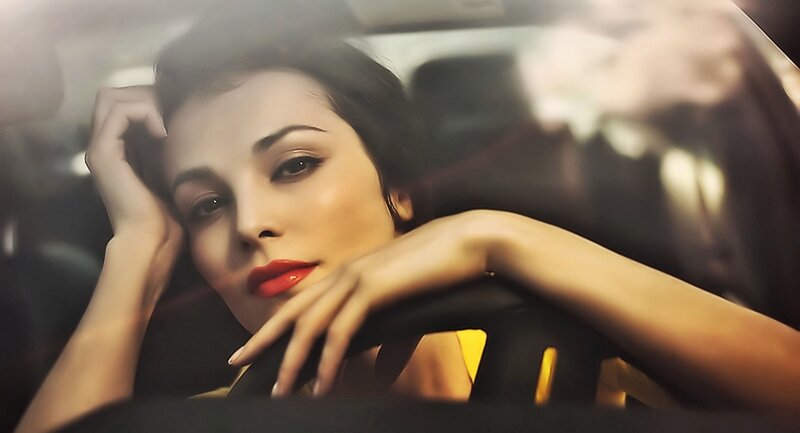 Woman in Car Interior — Black, Dramatic, Photograph, Steering Wheel, Red Lipstick