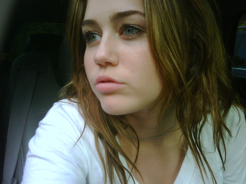 woman in car looking away