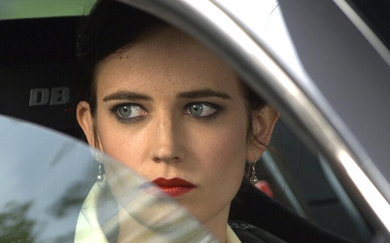 woman in car looking out window