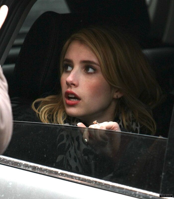 woman in car looking out window