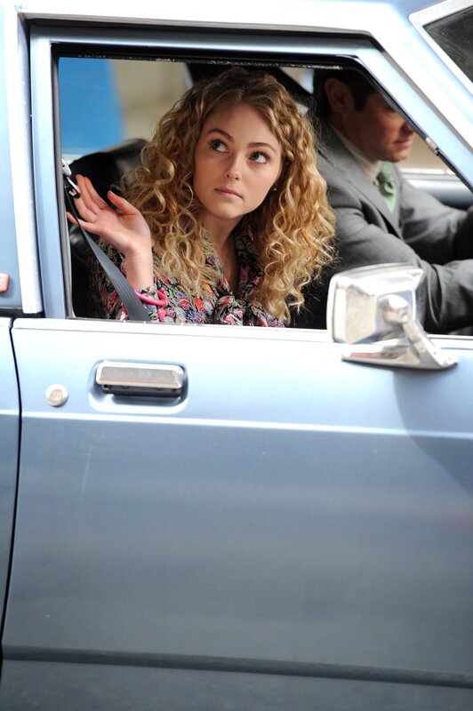 Woman in car looking out window