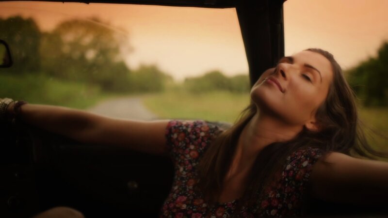 Woman in Car — Orange