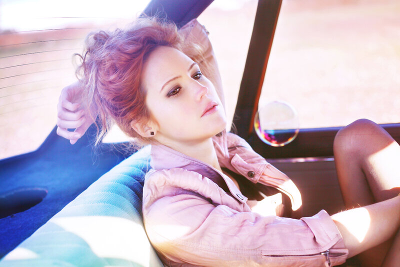 Woman in Car — Pink