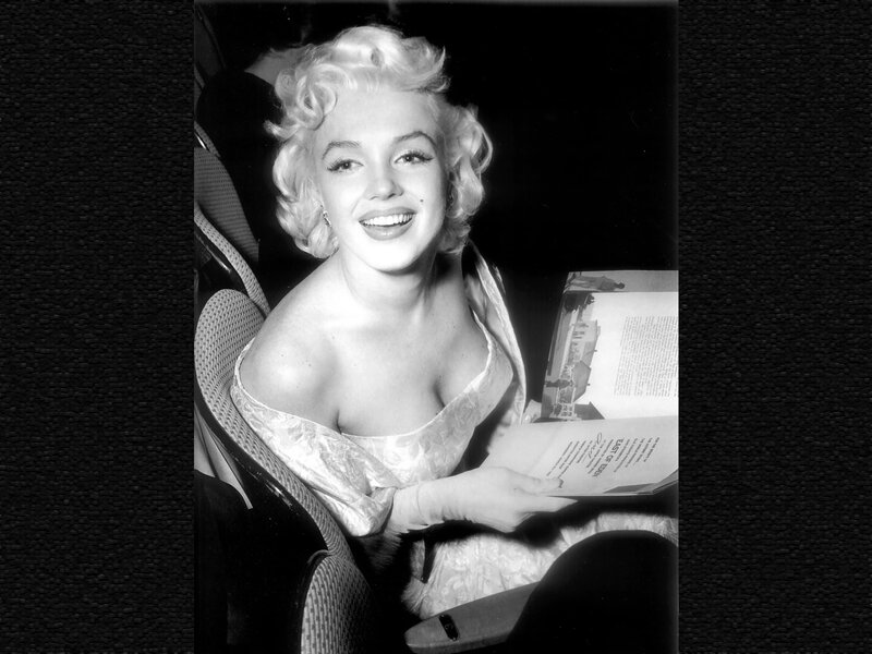 Woman in Car Reading