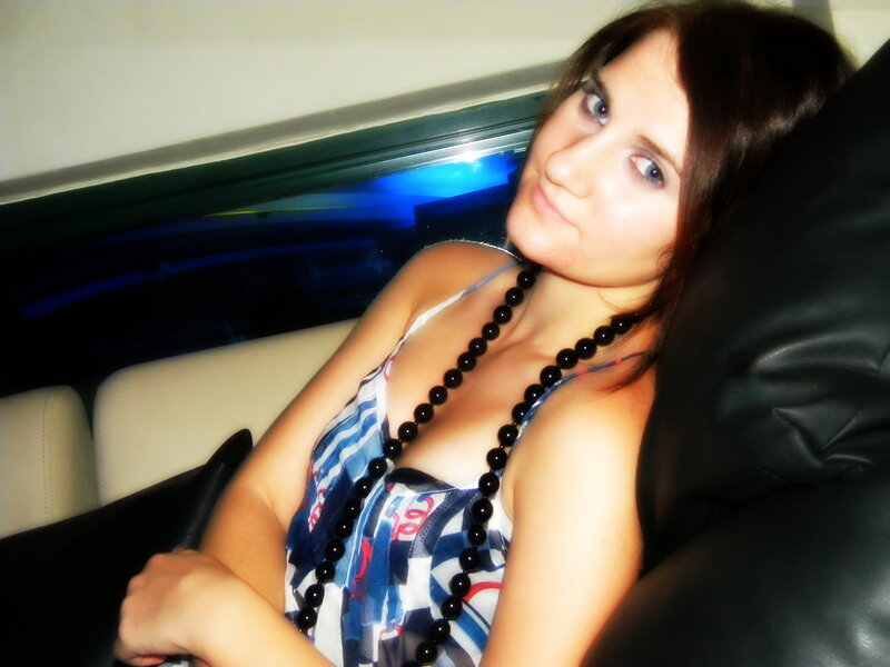 Woman in Car Seat — Blue