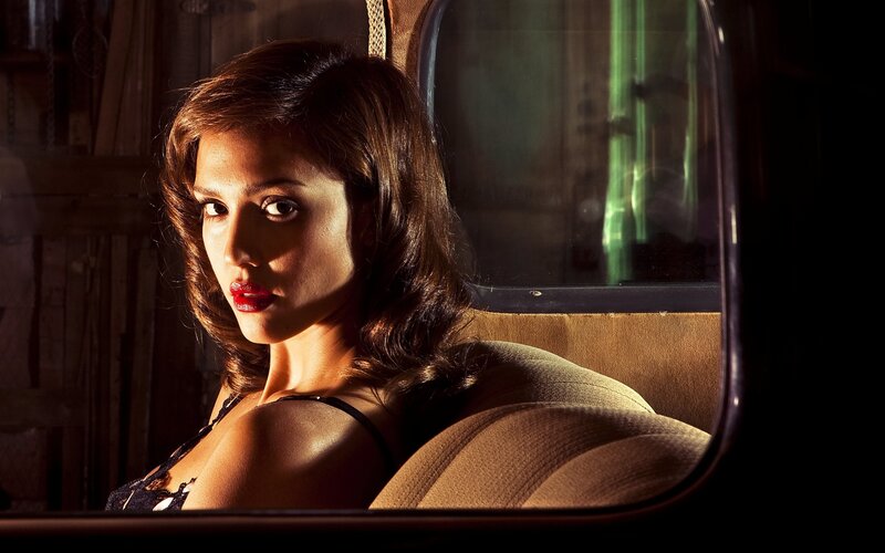 Woman in Car Seat — Brown, Dramatic