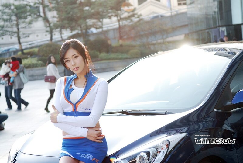 Woman in car show uniform