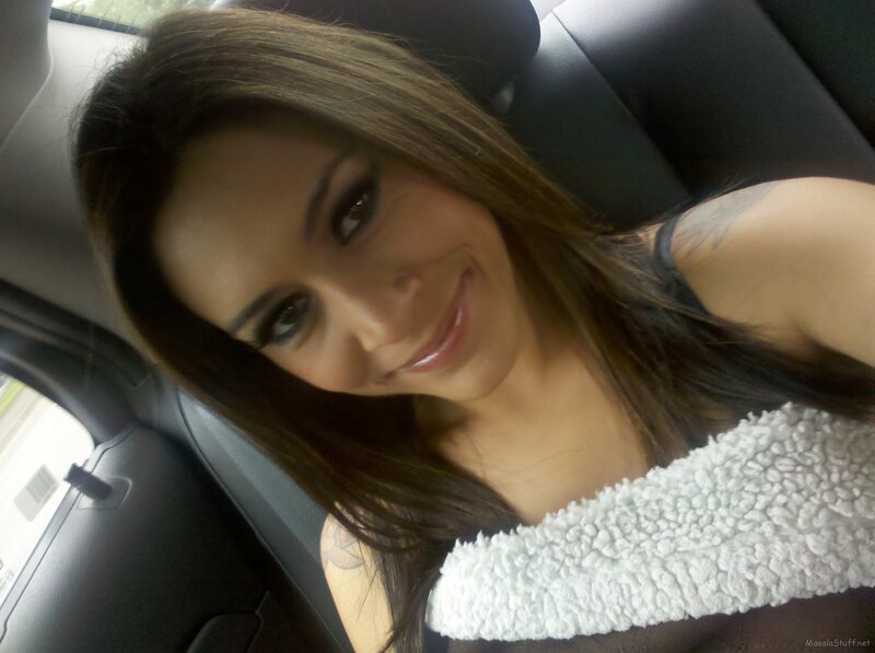 woman in car smiling