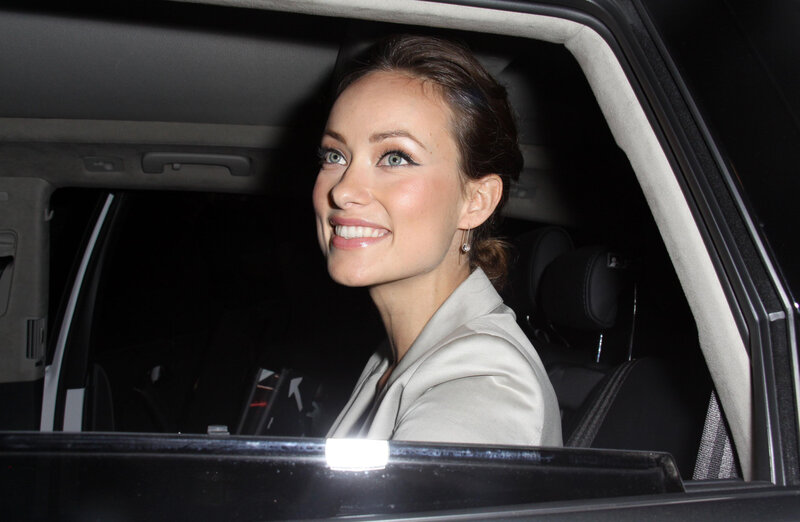 woman in car smiling