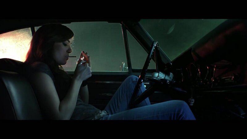 Woman in Car Smoking