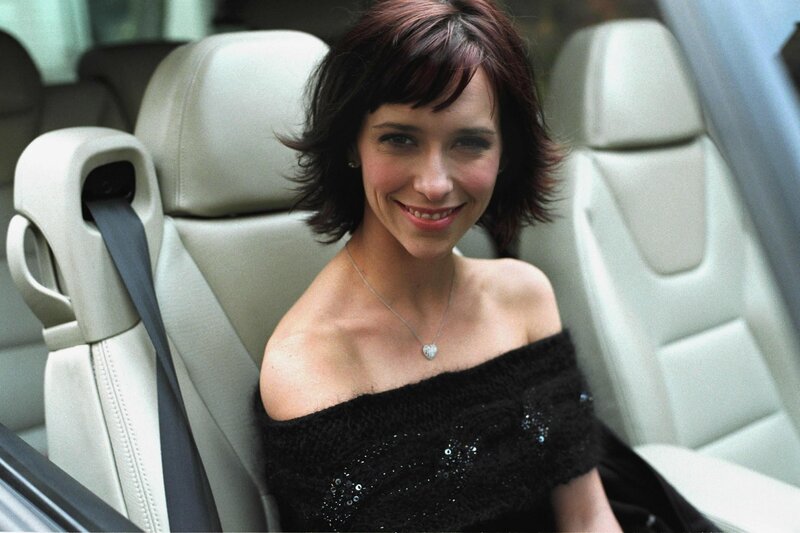 woman in car wearing black dress