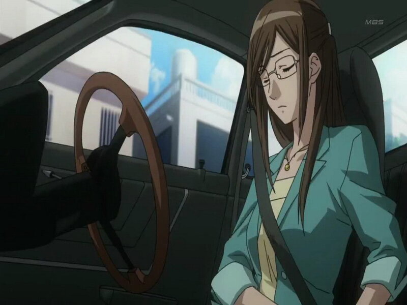 woman in car wearing glasses