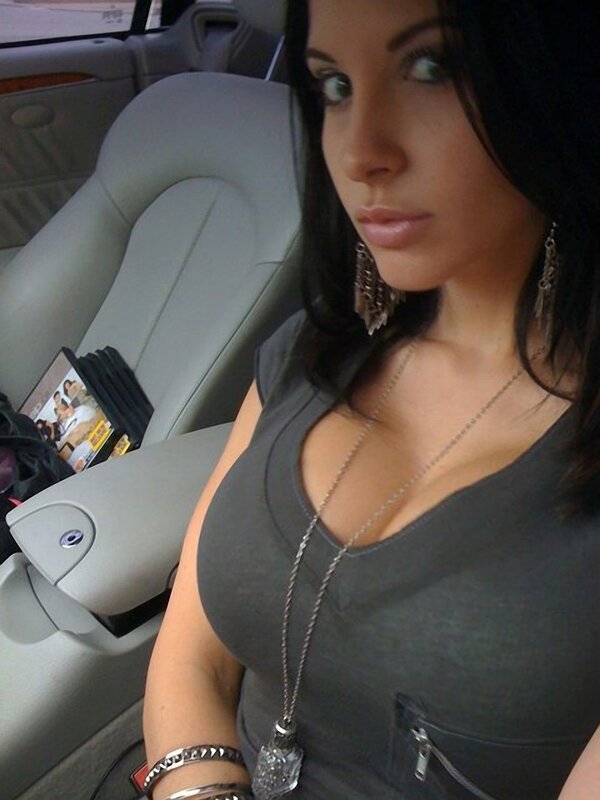 woman in car wearing gray top