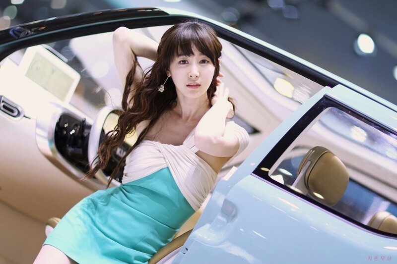 Woman in Car — White, Neutral, Photograph, Dress