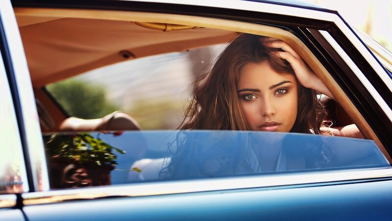 Woman in Car Window — Blue, Dramatic, Afternoon