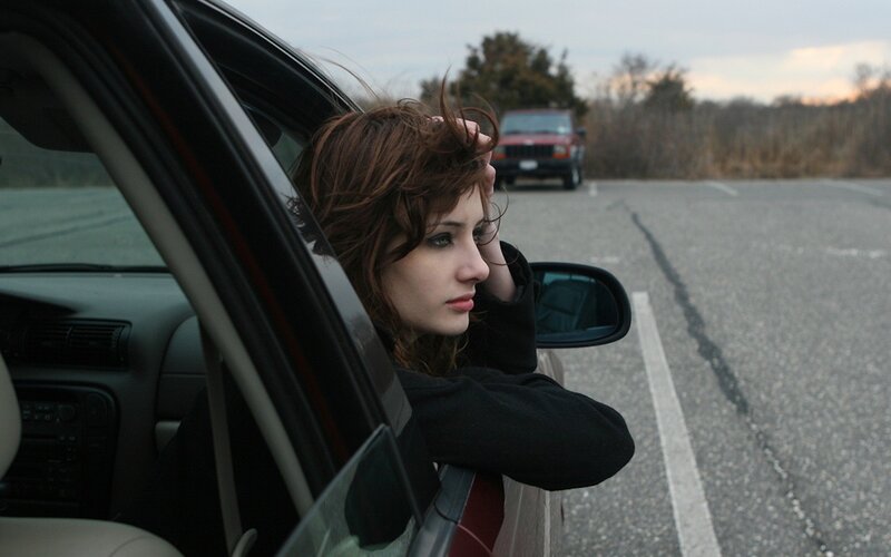 Woman in Car Window — Gray