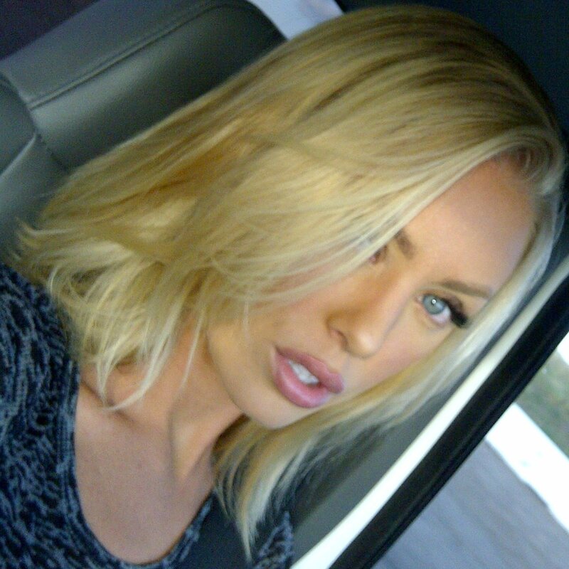woman in car with blonde hair
