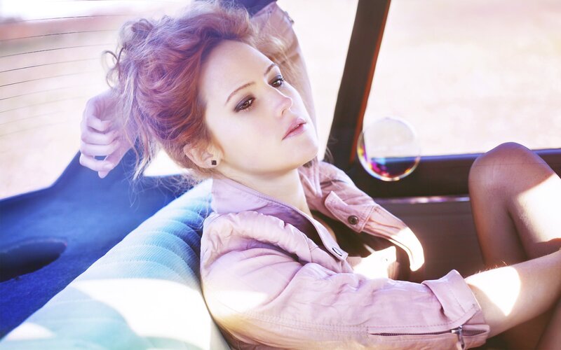 woman in car with bubble