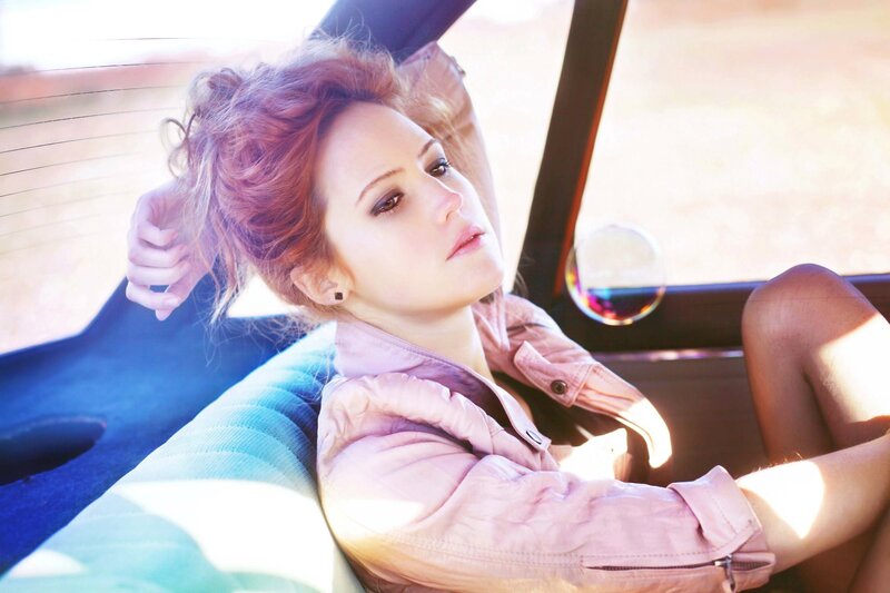 woman in car with bubble