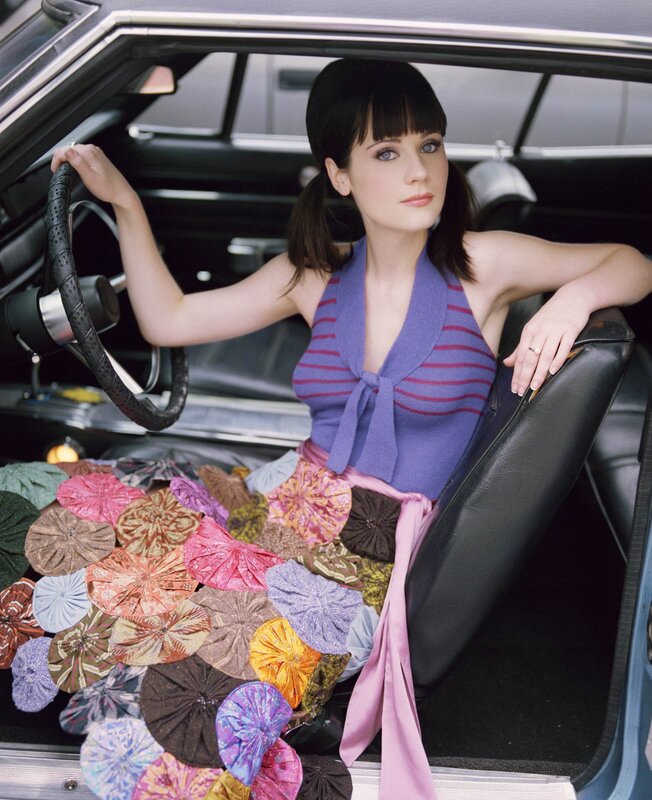 Woman in car with colorful skirt