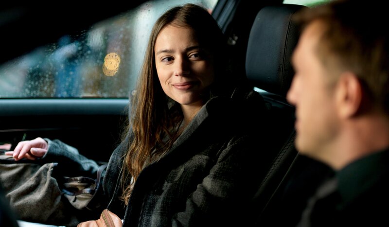 woman in car with man