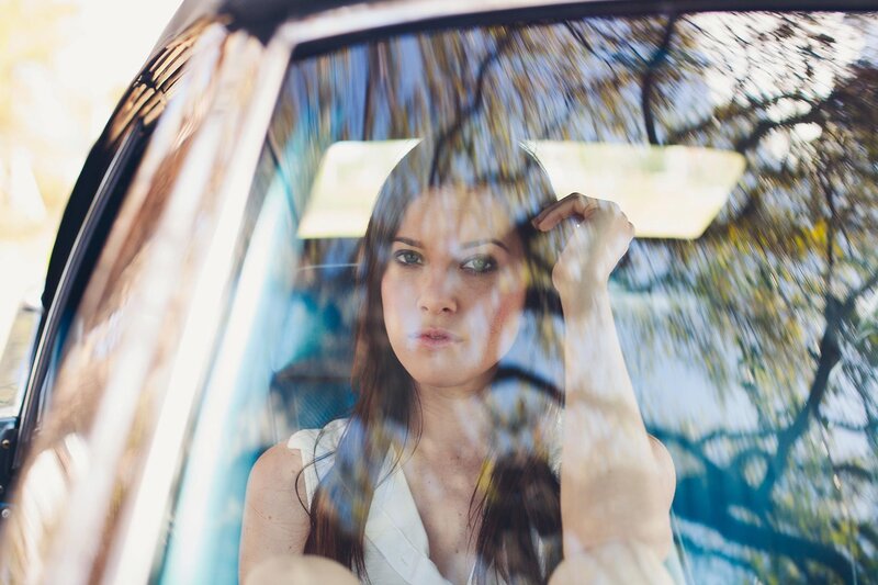 woman in car with motion blur