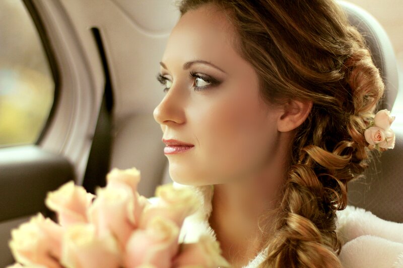 Woman in Car with Roses