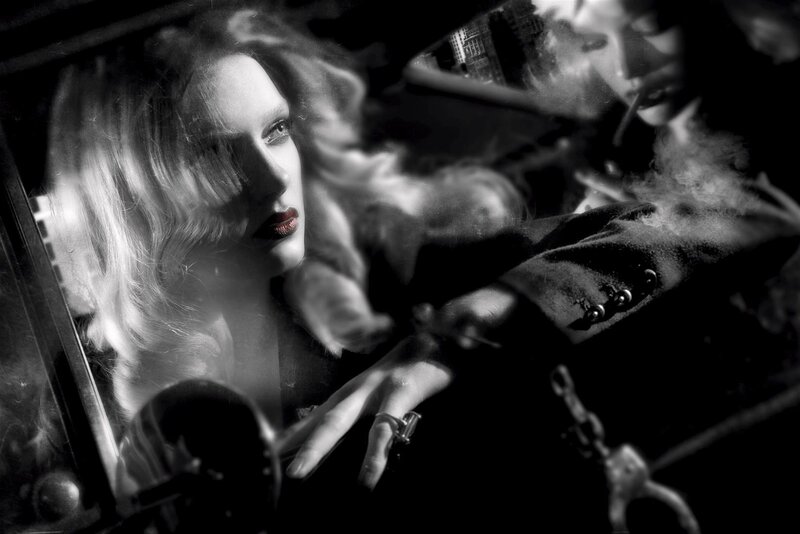 woman in car with smoke