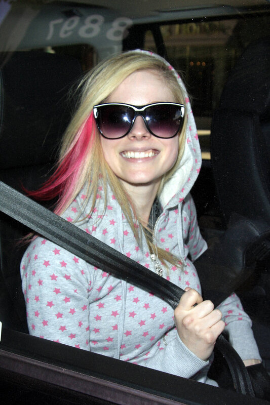 woman in car with sunglasses