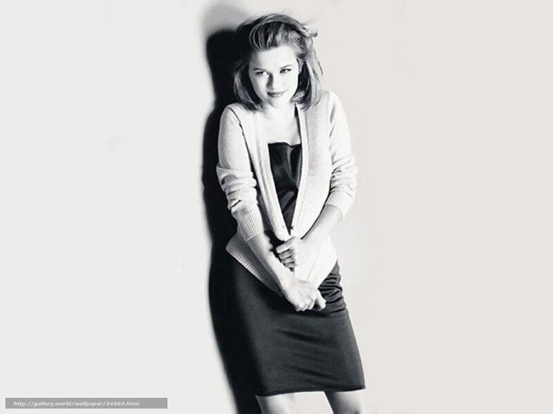woman in cardigan and skirt
