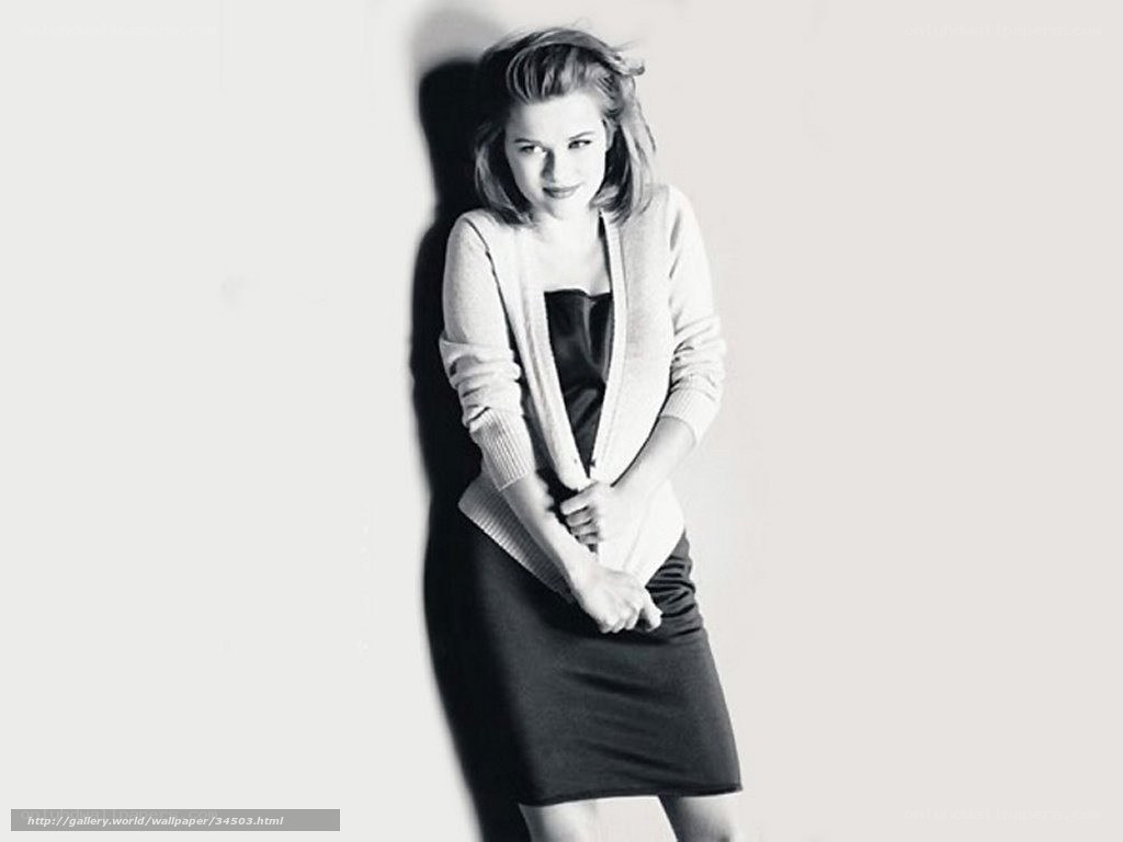 woman in cardigan and skirt