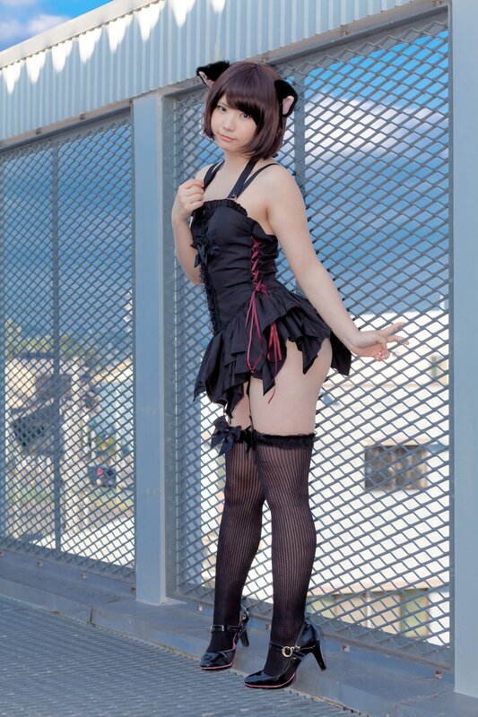 Woman in Cat Costume — Black, Playful, Afternoon
