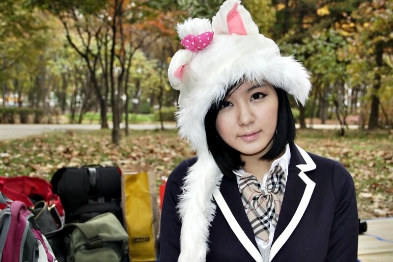 woman in cat hat outdoors