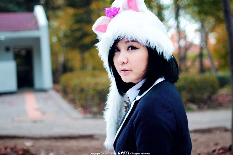 woman in cat hat outdoors