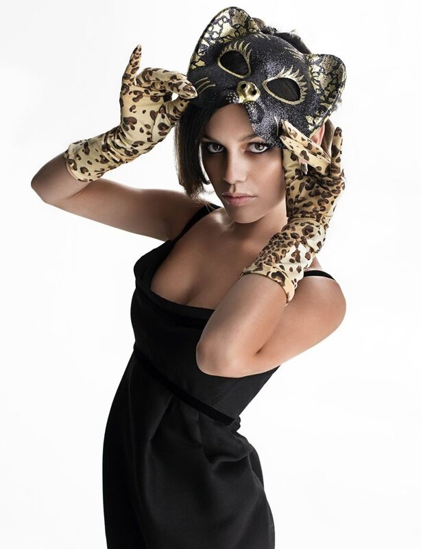 woman in cat mask and gloves