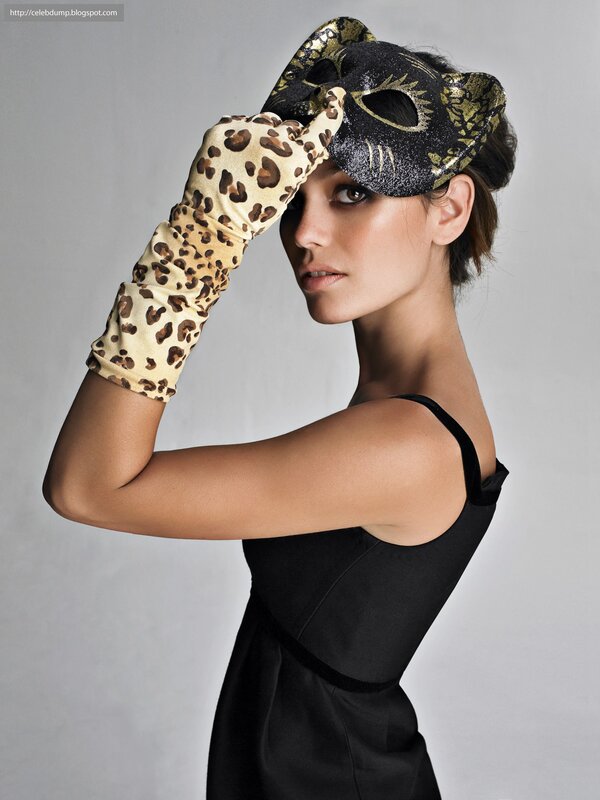 woman in cat mask and gloves